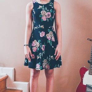 Black dress with embroidered flowers